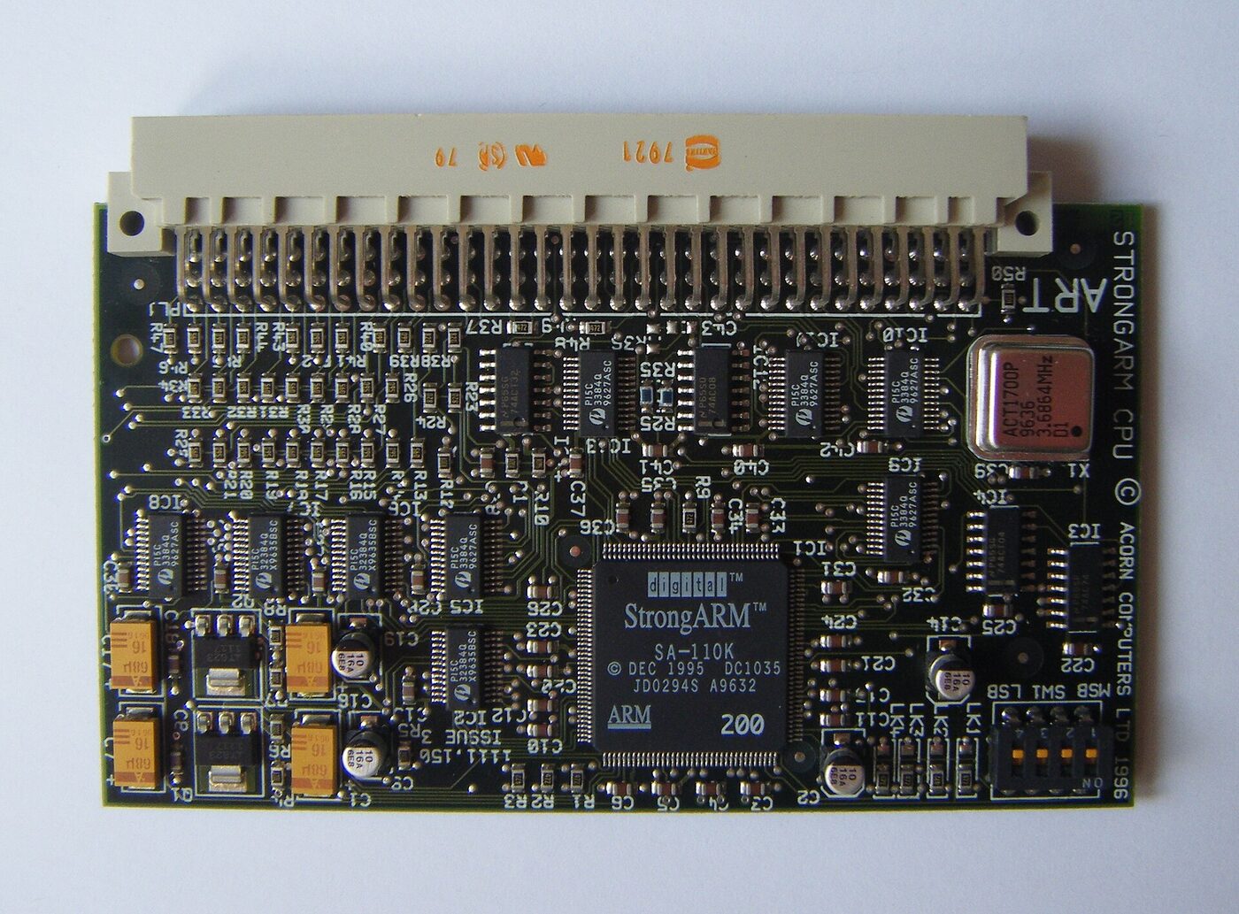 A small circuit board labelled StrongARM CPU, with a square plastic-packaged processor at its centre marked digital StrongARM SA-110K and a row of edge-connector pins along the top.