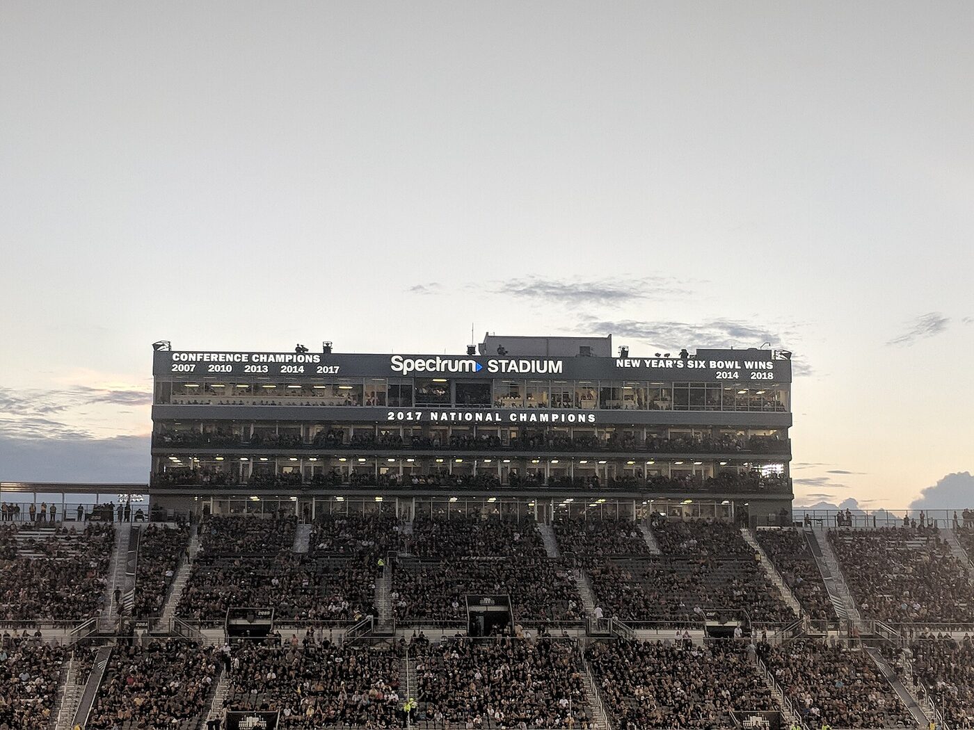 The press box of an American college football stadium carrying large lettering that includes the words National Champions.