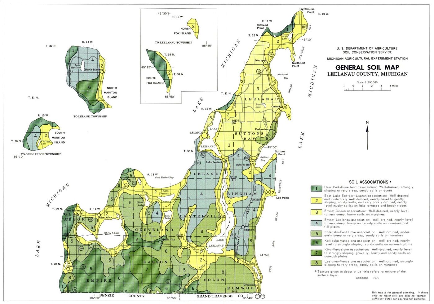 A printed county map divided into irregular coloured areas numbered one to eight, with a legend naming eight soil associations, township names, a scale bar and inset maps of two islands.