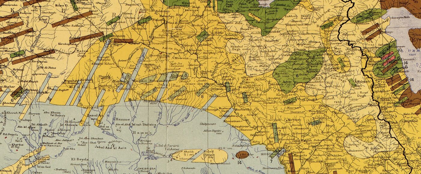 A colour-shaded section of an early twentieth-century printed map of upper Mesopotamia, with hachured relief, dense place names and small hatched bars carrying the numbers the compiler used for population groups.