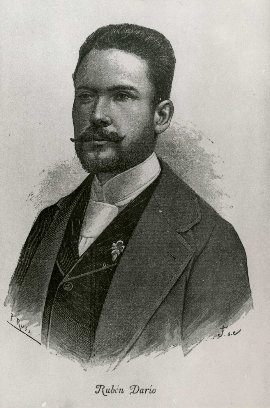 Printed head-and-shoulders portrait of a young dark-haired man with a moustache and short beard, in a high collar and dark coat, with the name Ruben Dario lettered beneath.